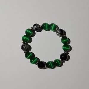 Glass green and black beads stretch bracelet